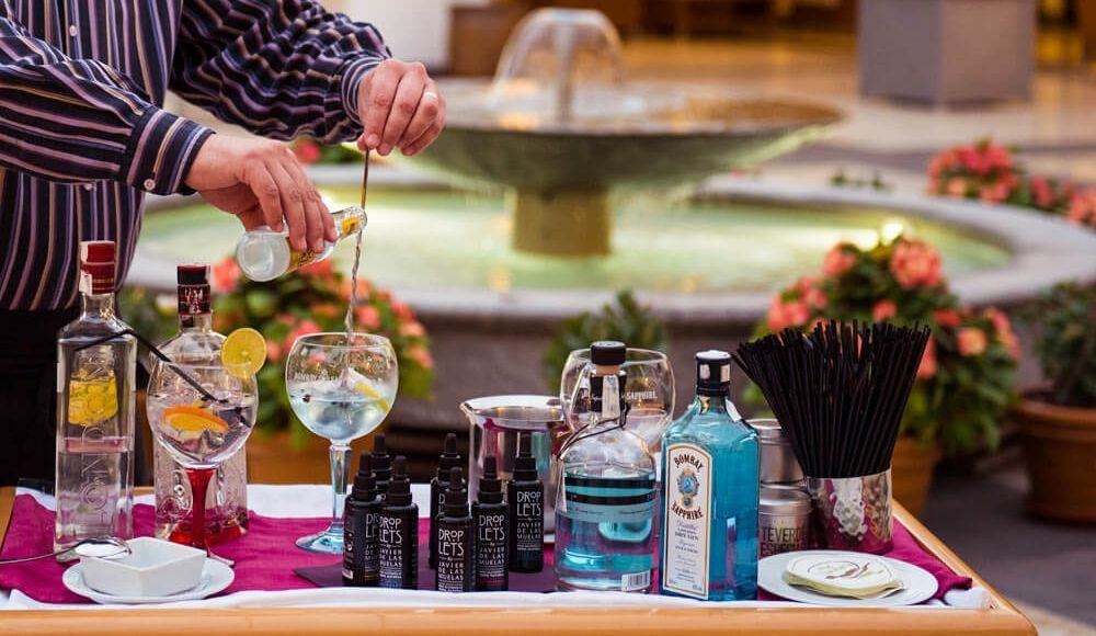 cocktail mixing in the courtyard