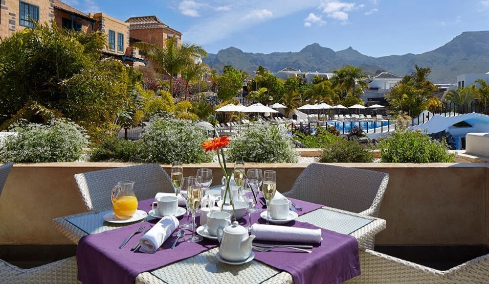 outdoor dining with a view of the scenic hills