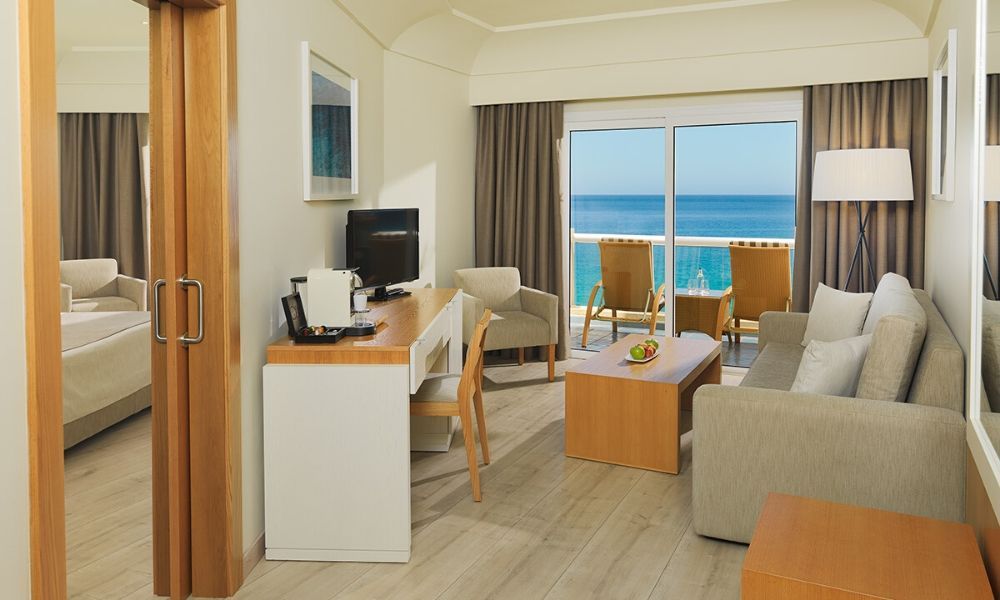 spacious suite with a view into the connecting bedroom
