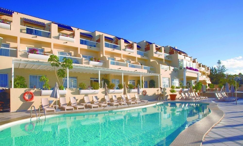 outdoor swimming pool and exterior of the hotel
