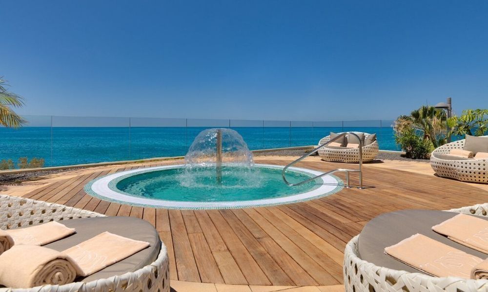 small swimming pool overlooking the ocean