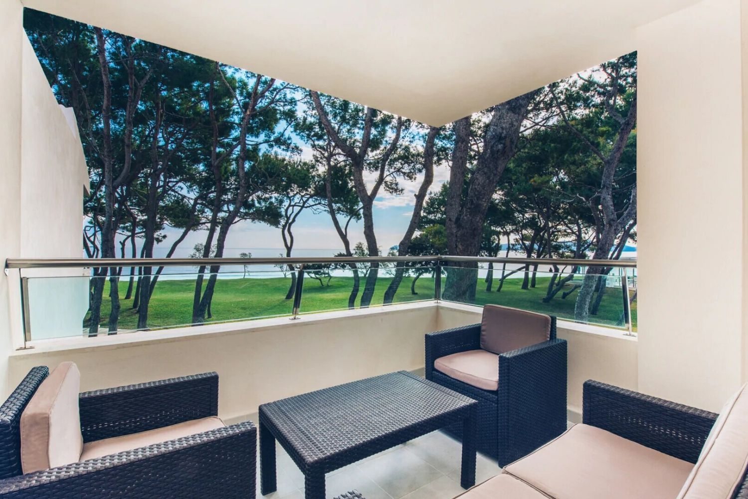 balcony terrace with a view of the gardens and ocean