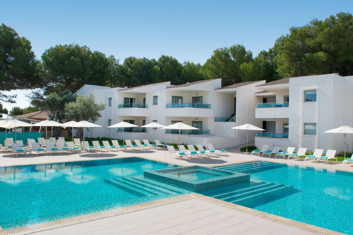 hotel exterior and outdoor swimming pool