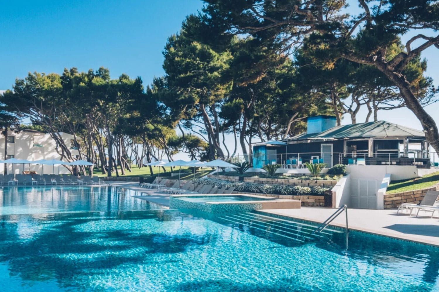 hotel exterior and outdoor swimming pool