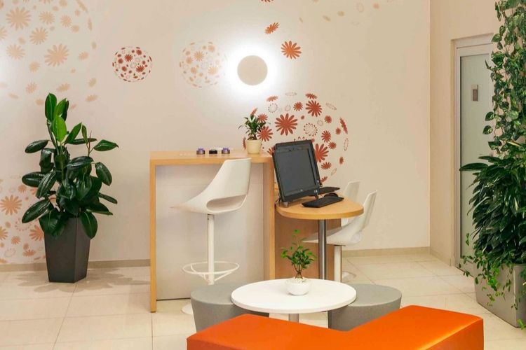 computer station near the soft seating