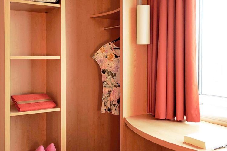 wardrobe housing women's clothing