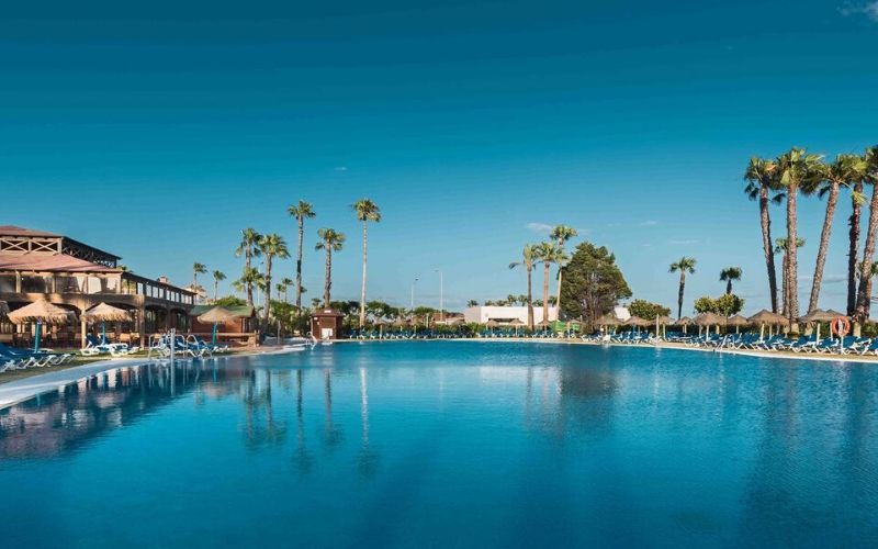 hotel exterior and outdoor swimming pool