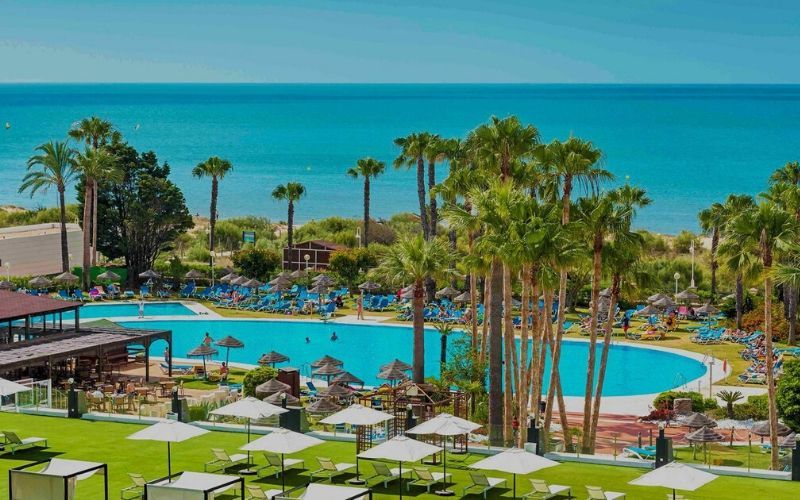 hotel exterior and outdoor swimming pool