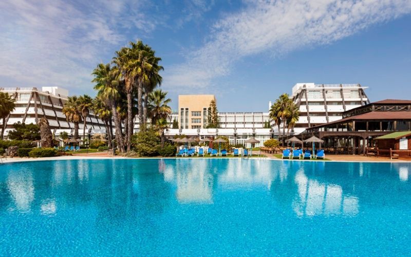 hotel exterior and outdoor swimming pool