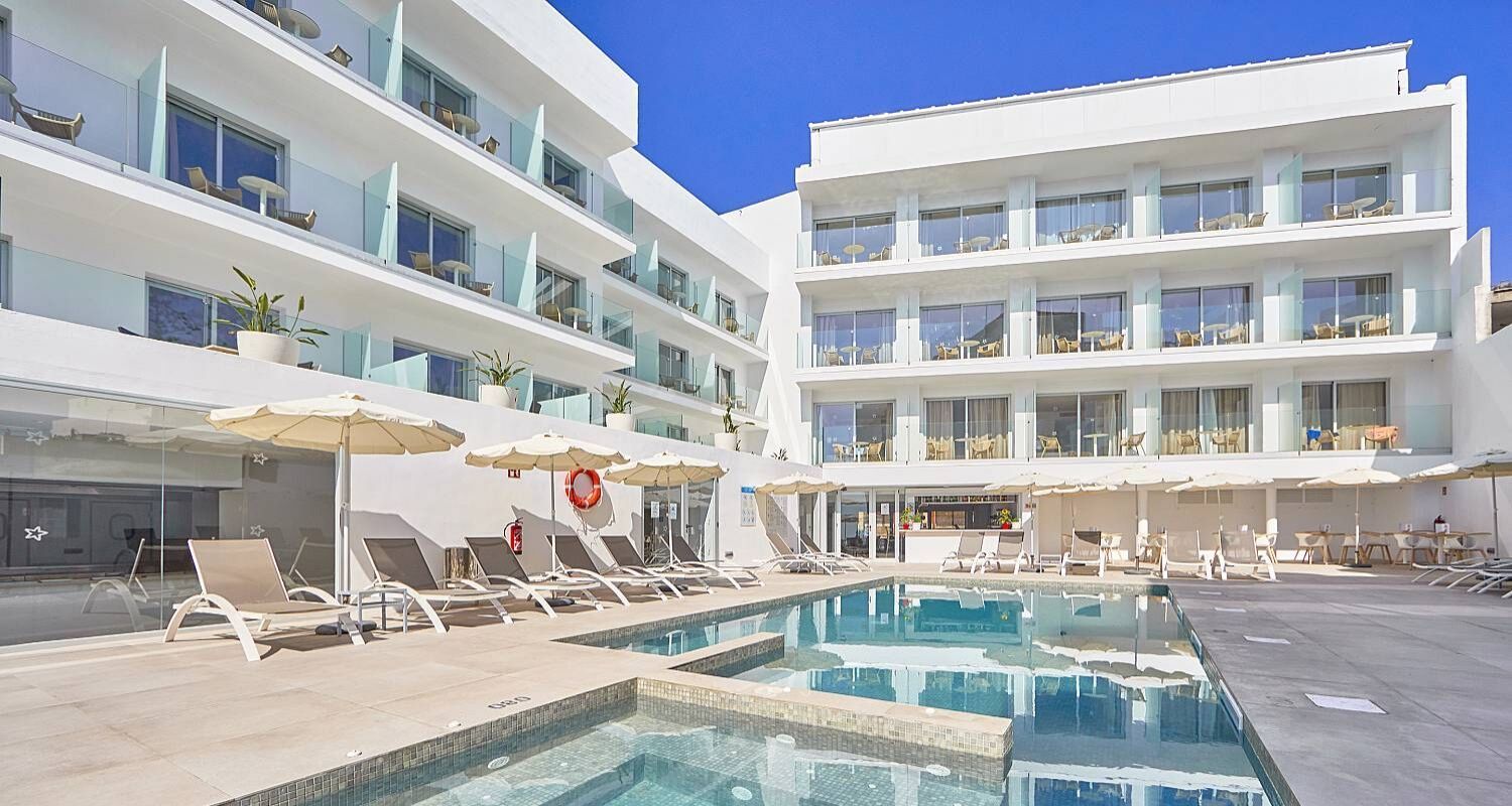 hotel exterior showing balconies and the outdoor swimming pool