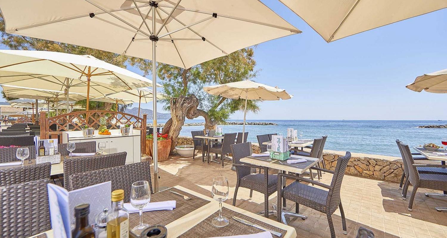outdoor dining area and sea view