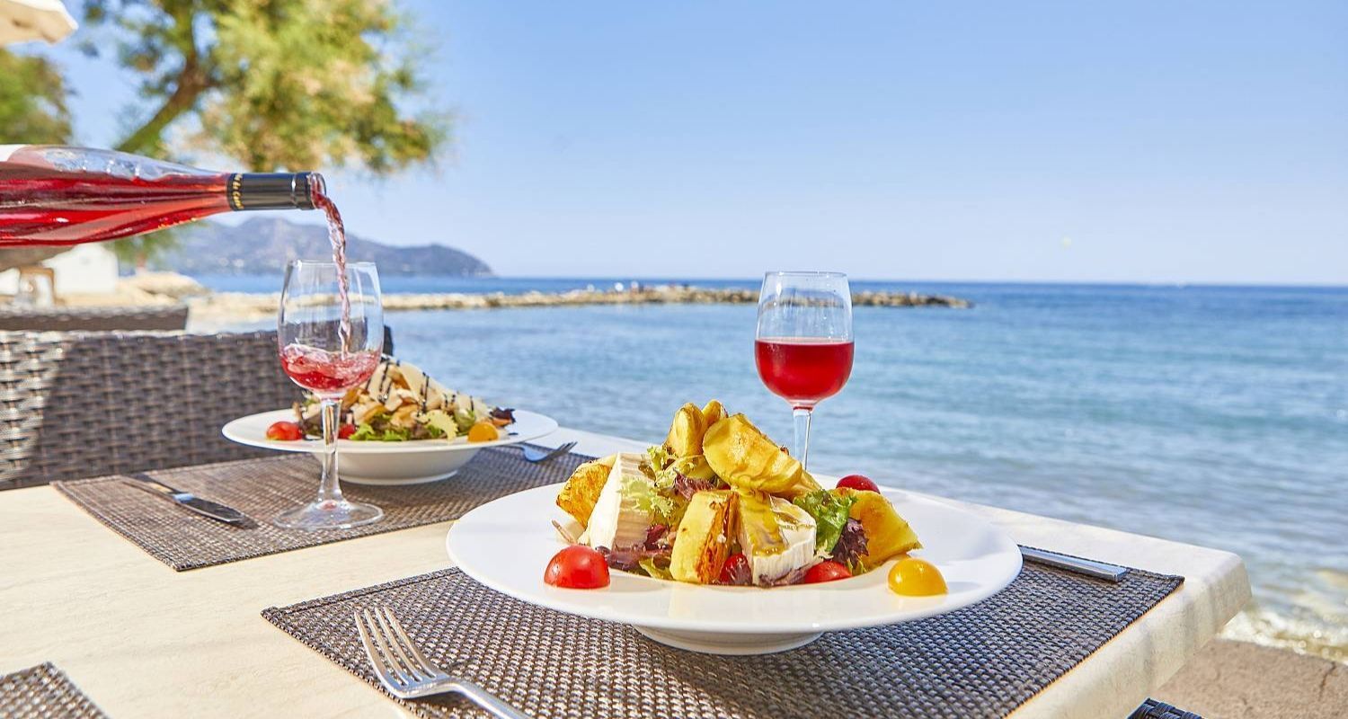 outdoor dining on the seafront with a delicious glass of rosé