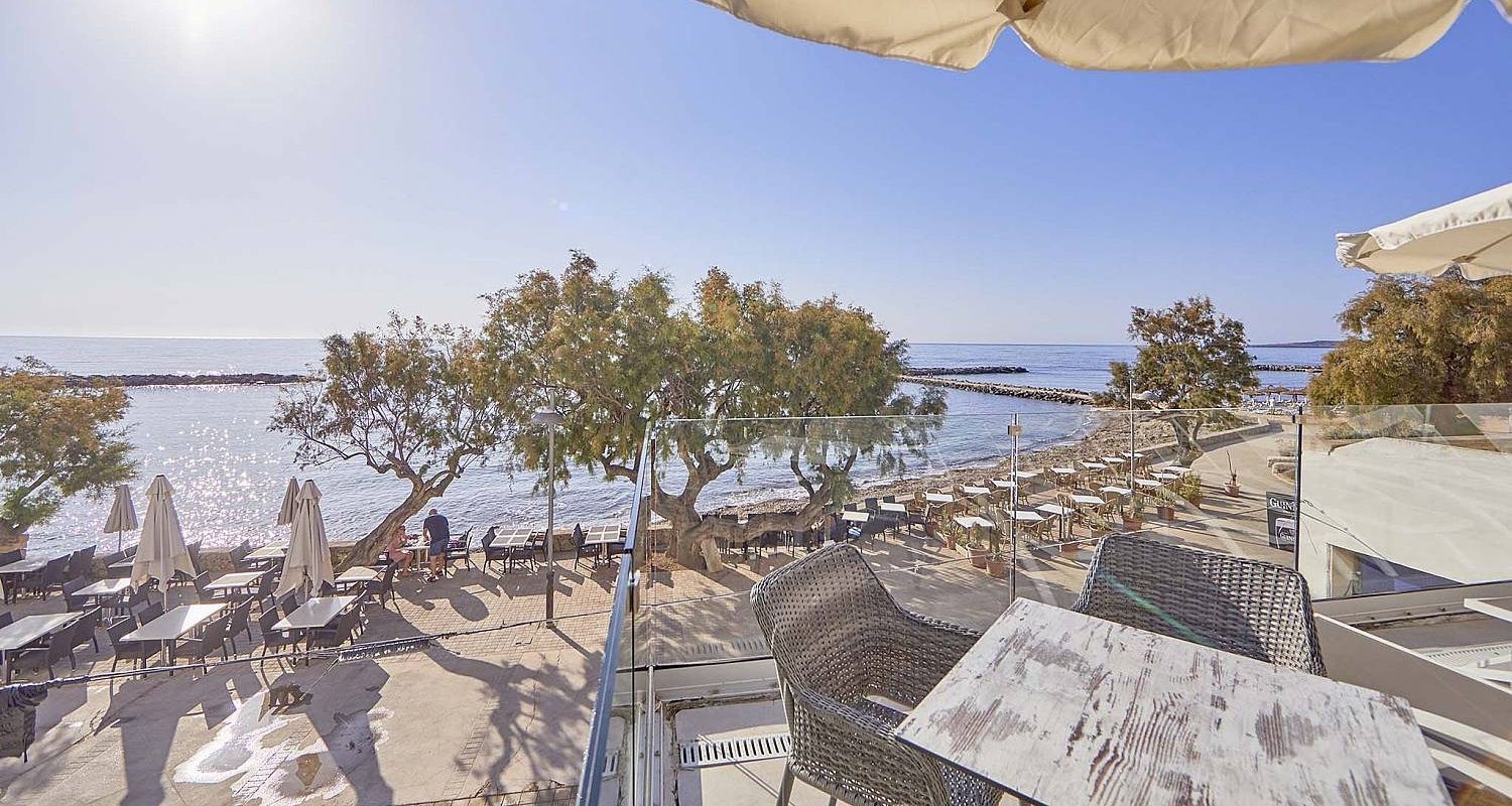 balcony terrace with a dining area and sea view