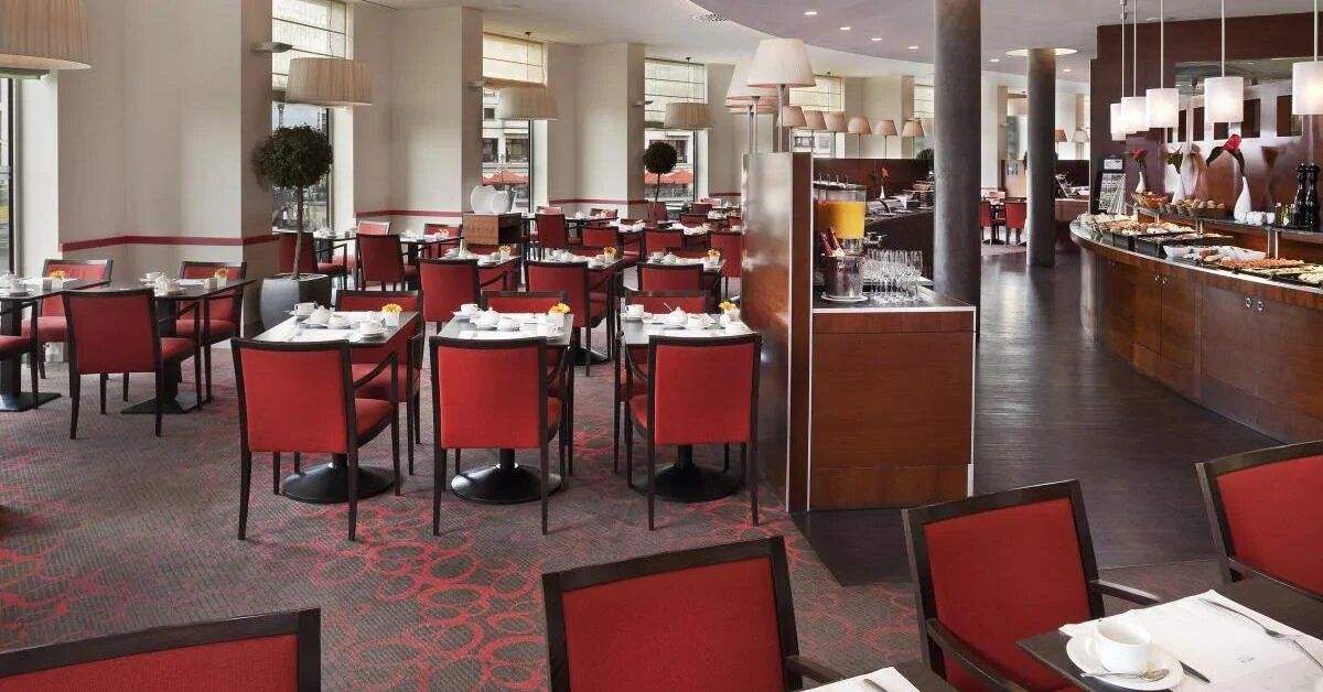 indoor restaurant and dining area - Melia Berlin accessible hotel