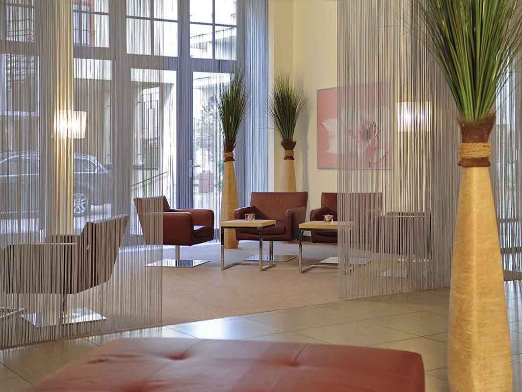 indoor lounge area near the hotel entrance