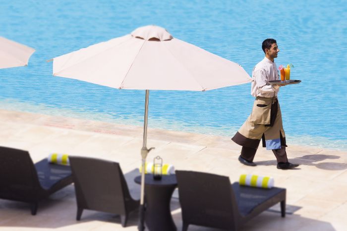 aerial view of wait staff near the outdoor swimming pool