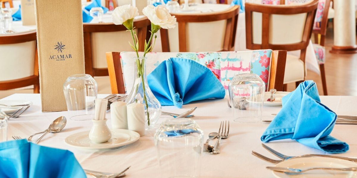 blue napkins on the dining table