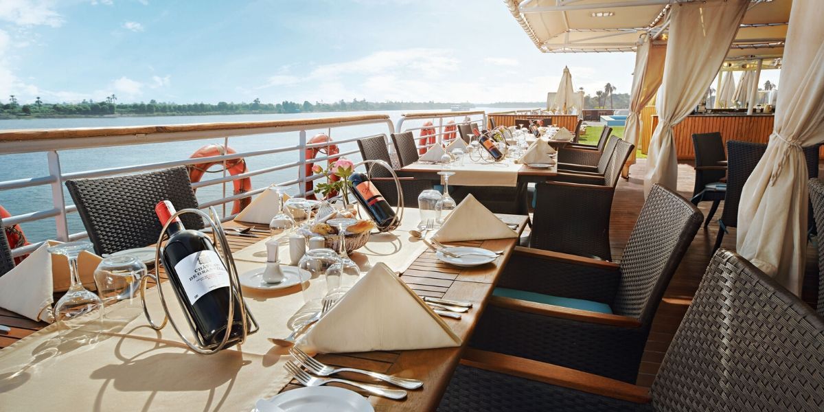 outdoor dining table overlooking the river