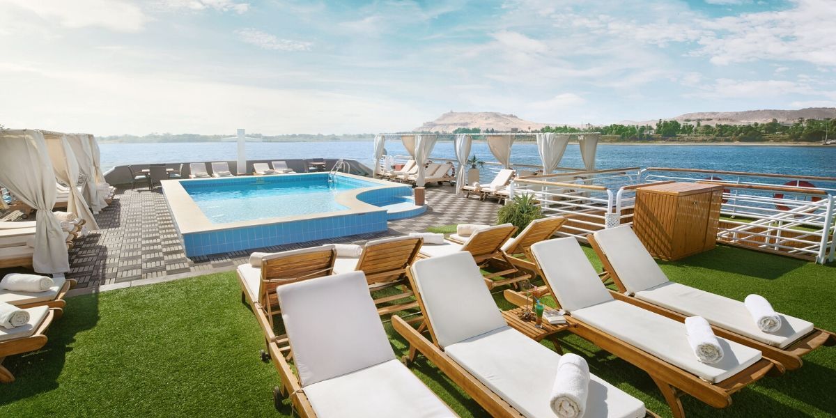 sunbeds turned away from the swimming pool