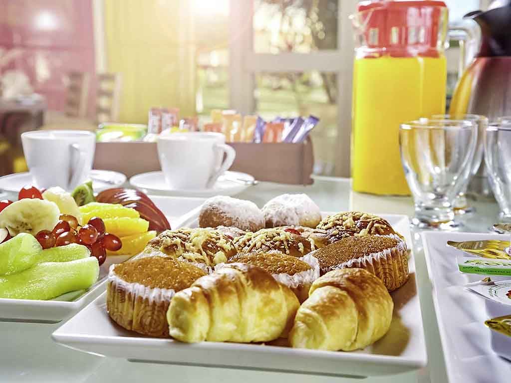 fruit and pastries from the breakfast buffet