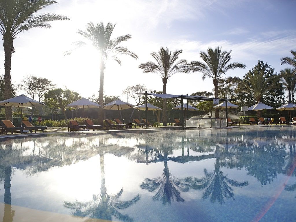 hotel exterior and outdoor swimming pool