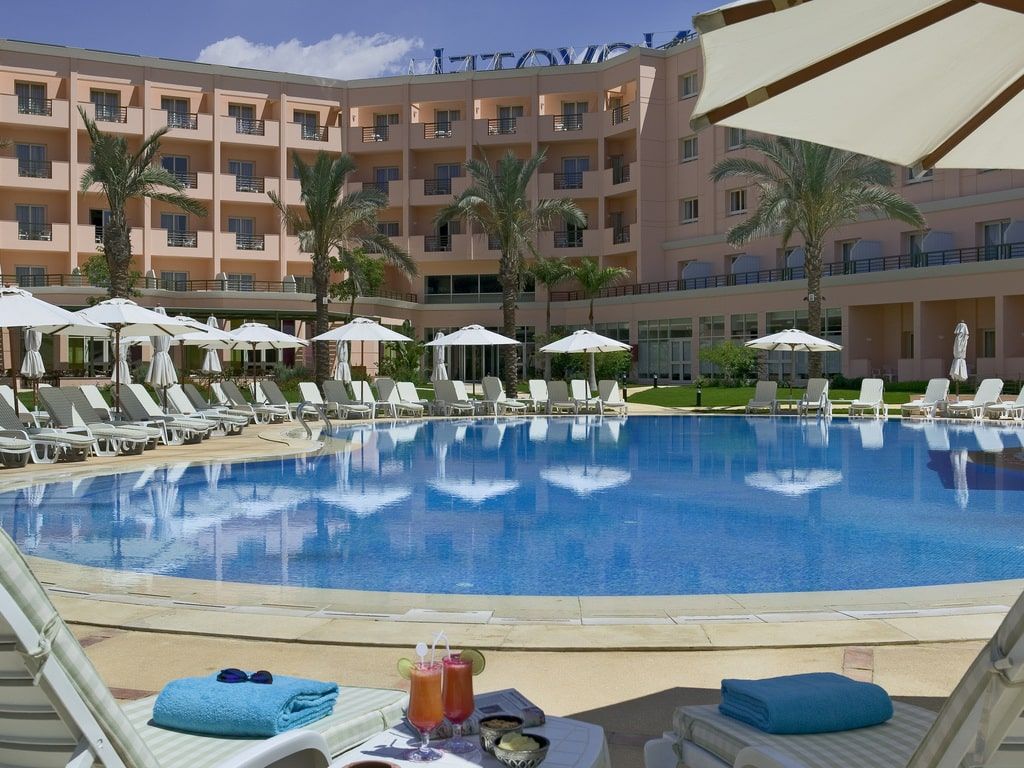 hotel exterior and outdoor swimming pool