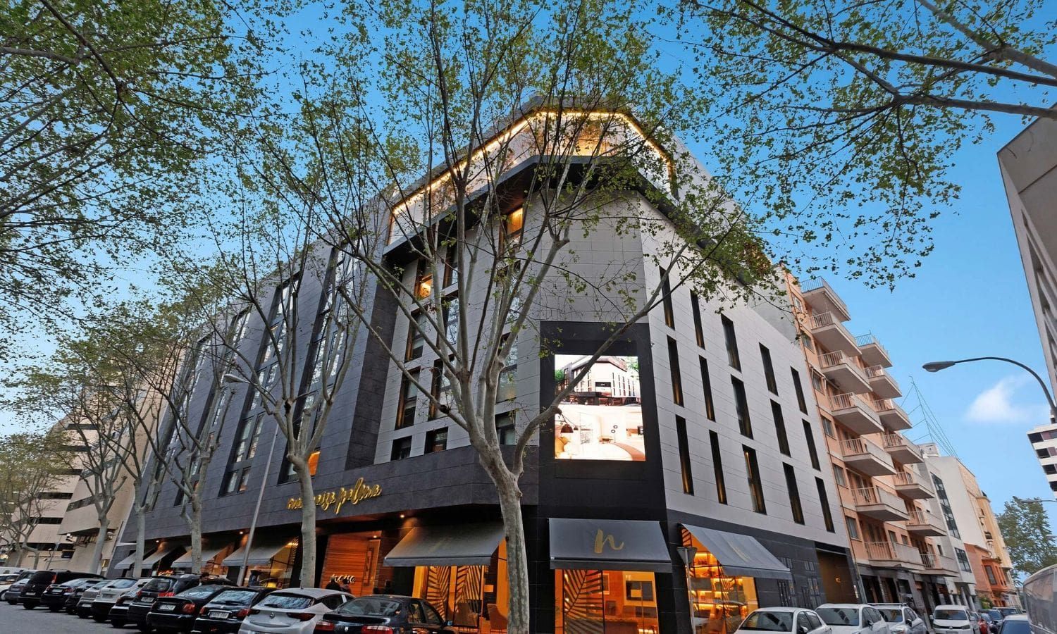 hotel exterior against a clear blue sky