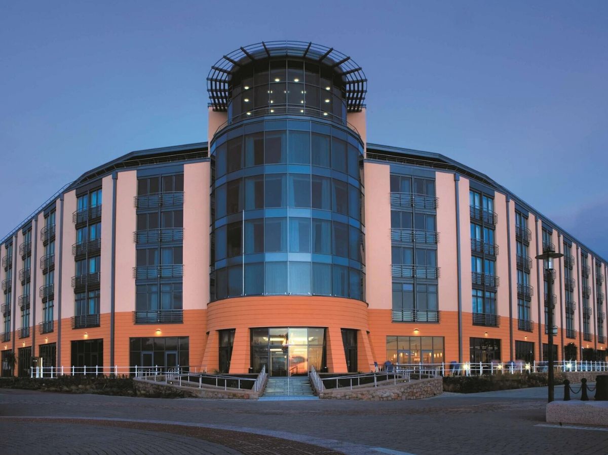 entrance into the hotel with visible wheelchair ramps
