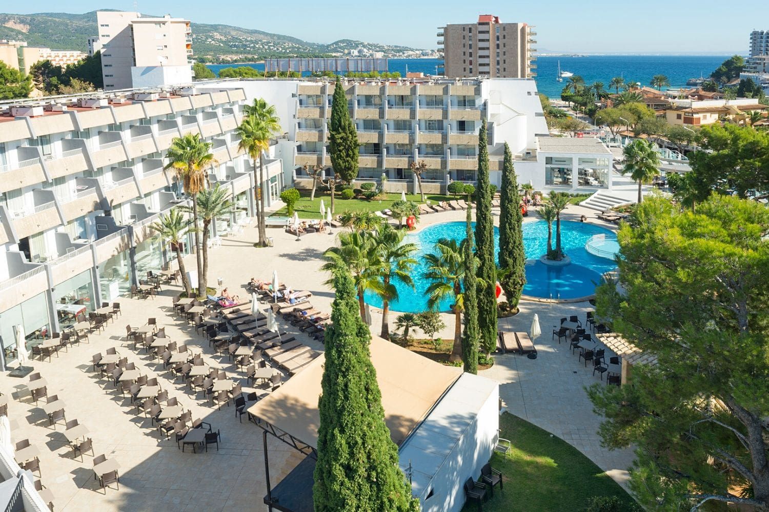hotel exterior and outdoor swimming pool