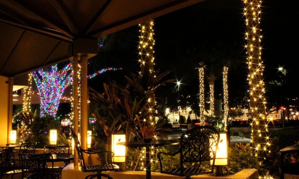 outdoor dining area with Christmas lights