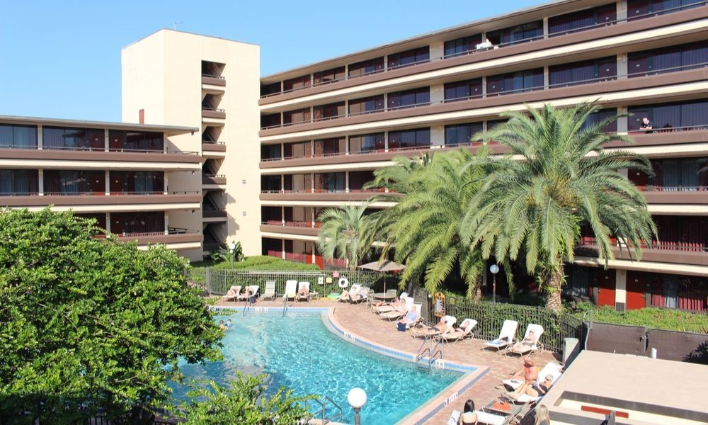 wide view of the outdoor swimming pool and apartments
