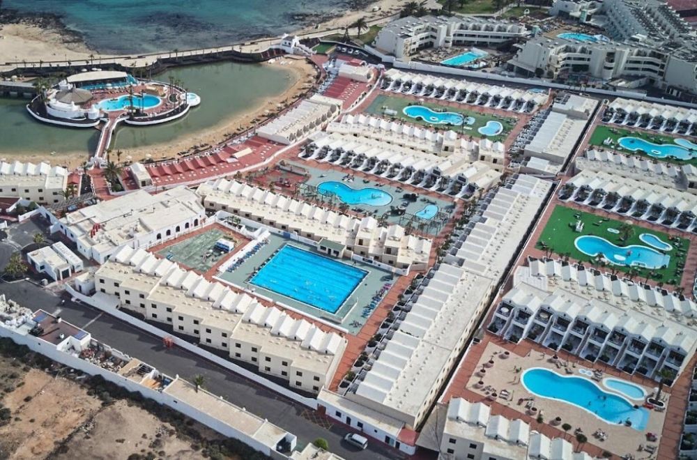 aerial view of the hotel grounds showing its nine outdoor swimming pools