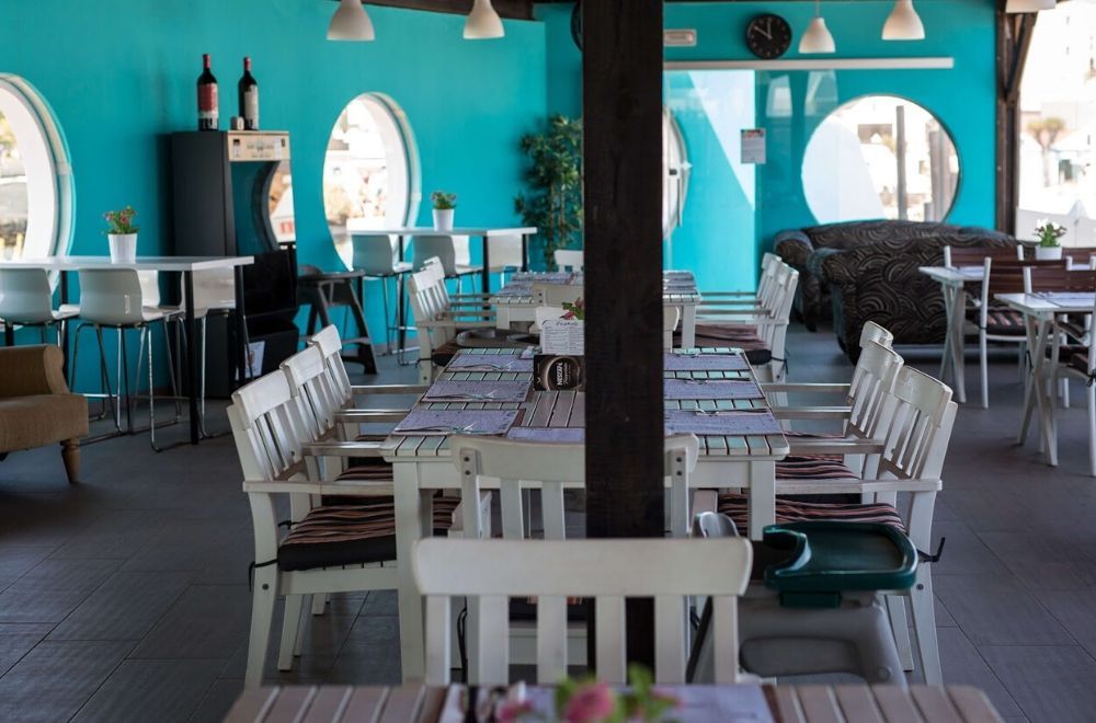 indoor restaurant with turquoise walls