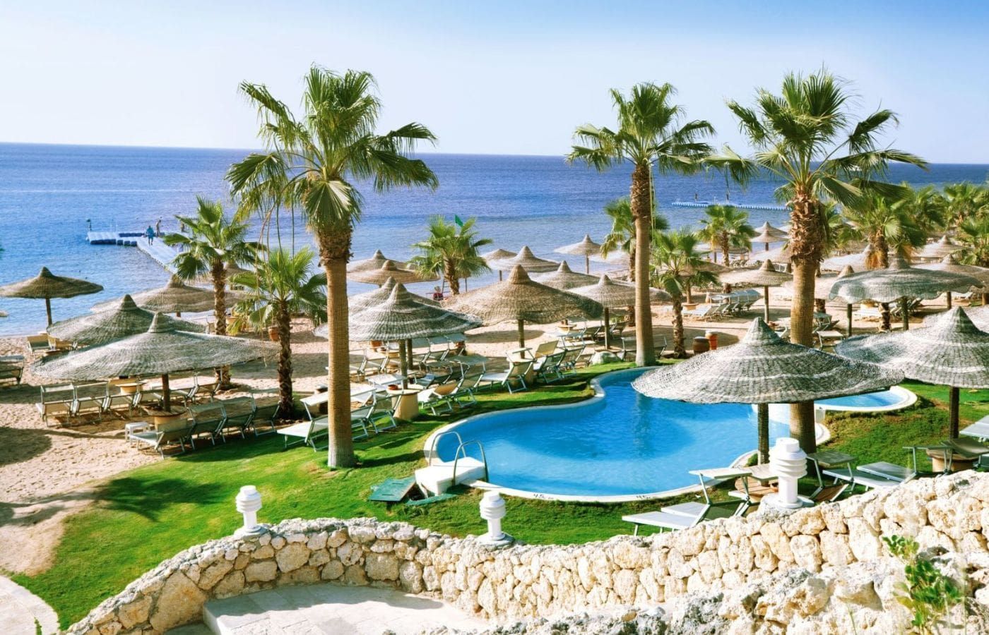 aerial view of the resort with an outdoor swimming pool