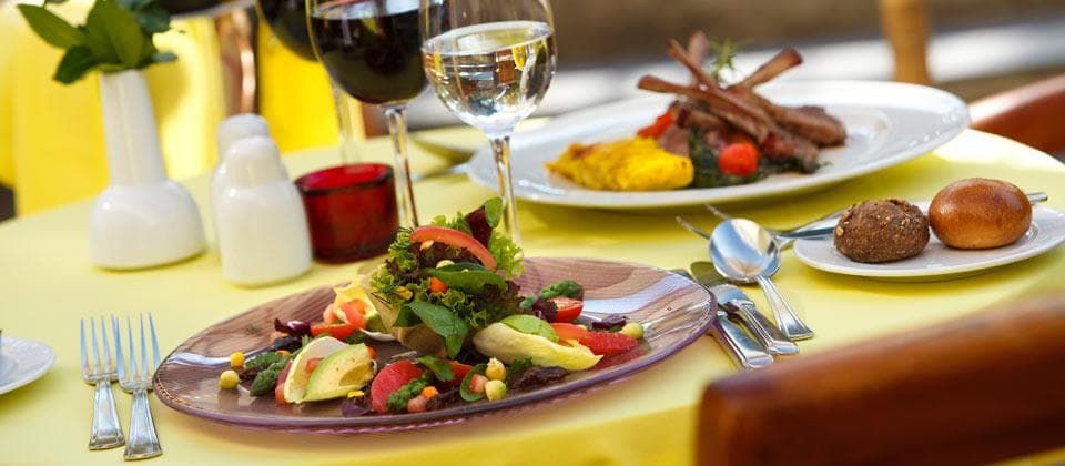 outdoor dining with delicious food laid out on the table