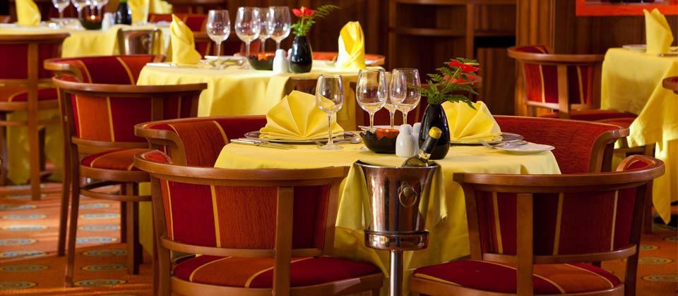 indoor dining room with a chilled bottle of champagne