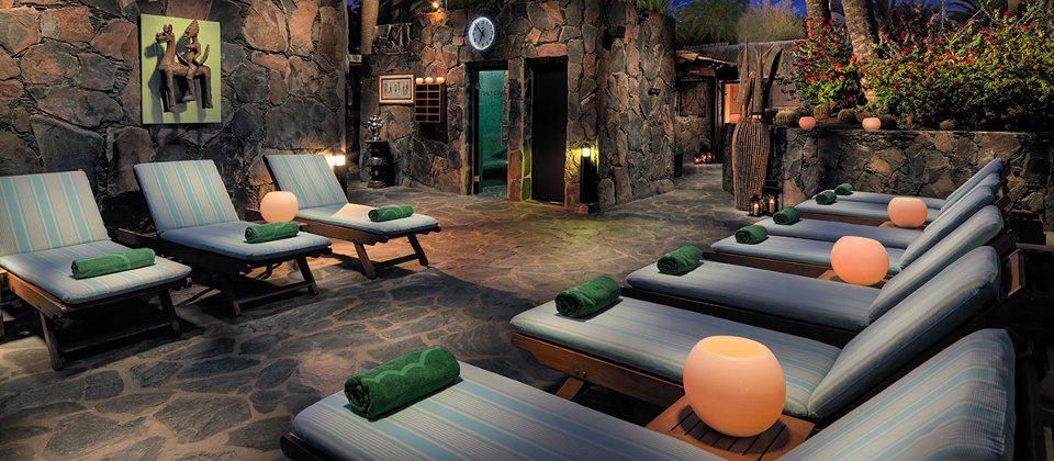 indoor spa area with sunbeds