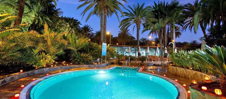 outdoor swimming pool illuminated at night