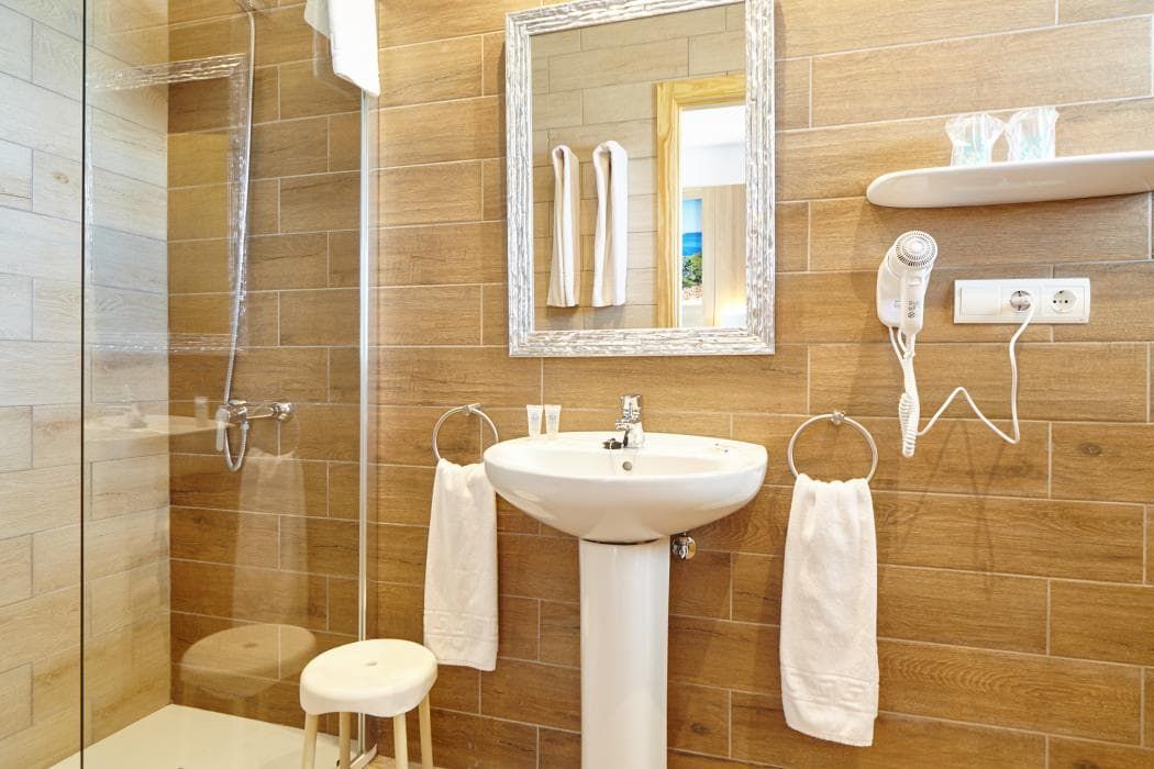 accessible bathroom with shower chair