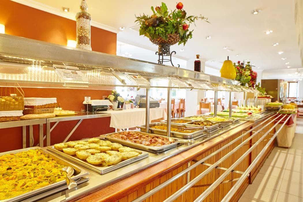 indoor buffet with an assortment of food