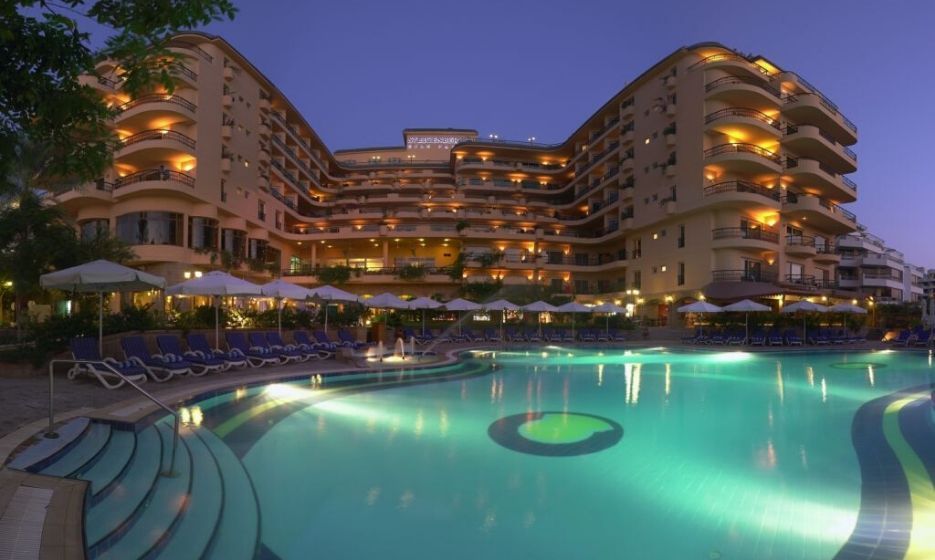 hotel exterior and outdoor swimming pool