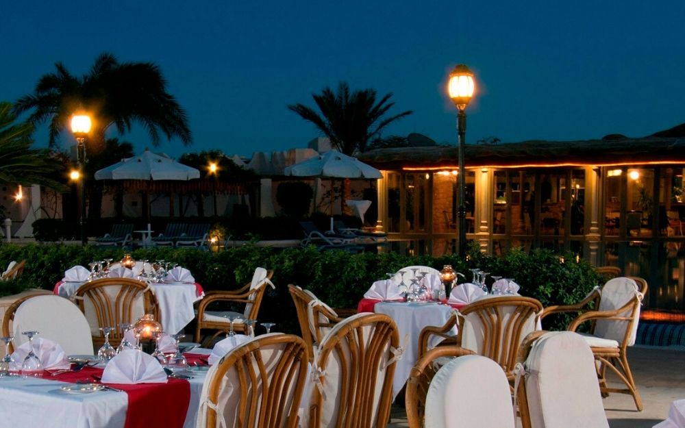 outdoor dining area near the pool