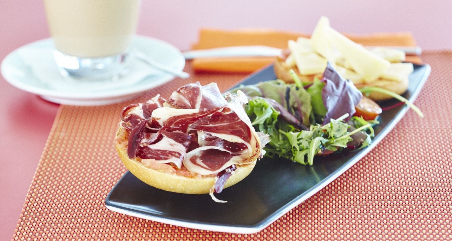 healthy breakfast with some fruit, lettuce and delicious parma ham