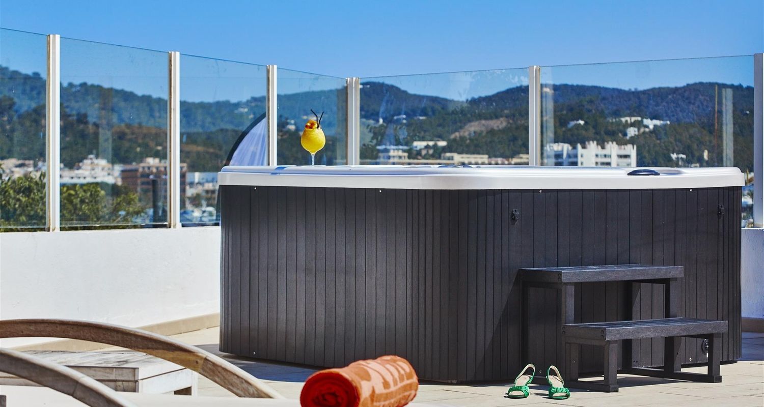 outdoor hot tub with a cocktail where you can just sit and enjoy the view