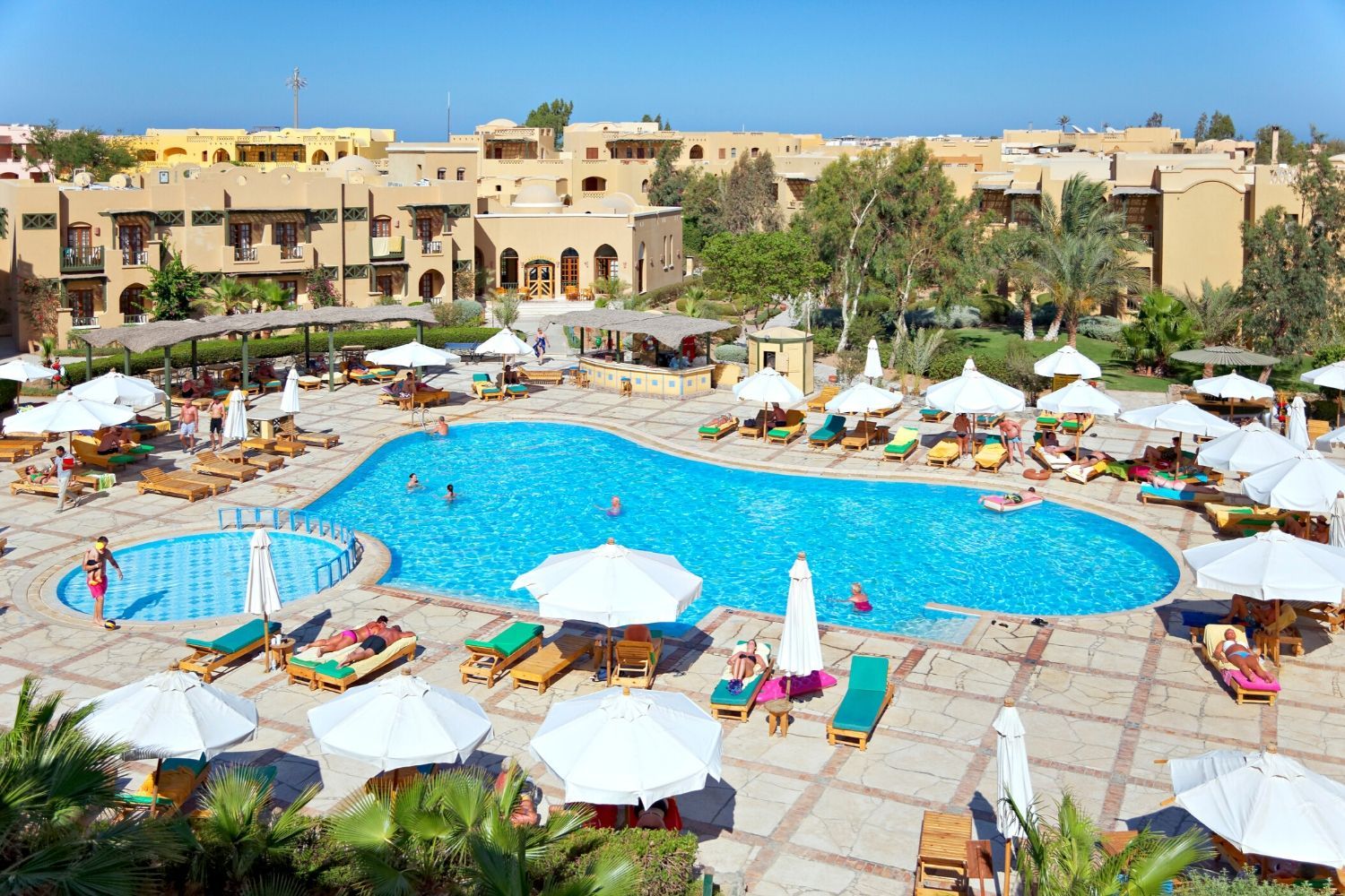 hotel exterior and outdoor swimming pool