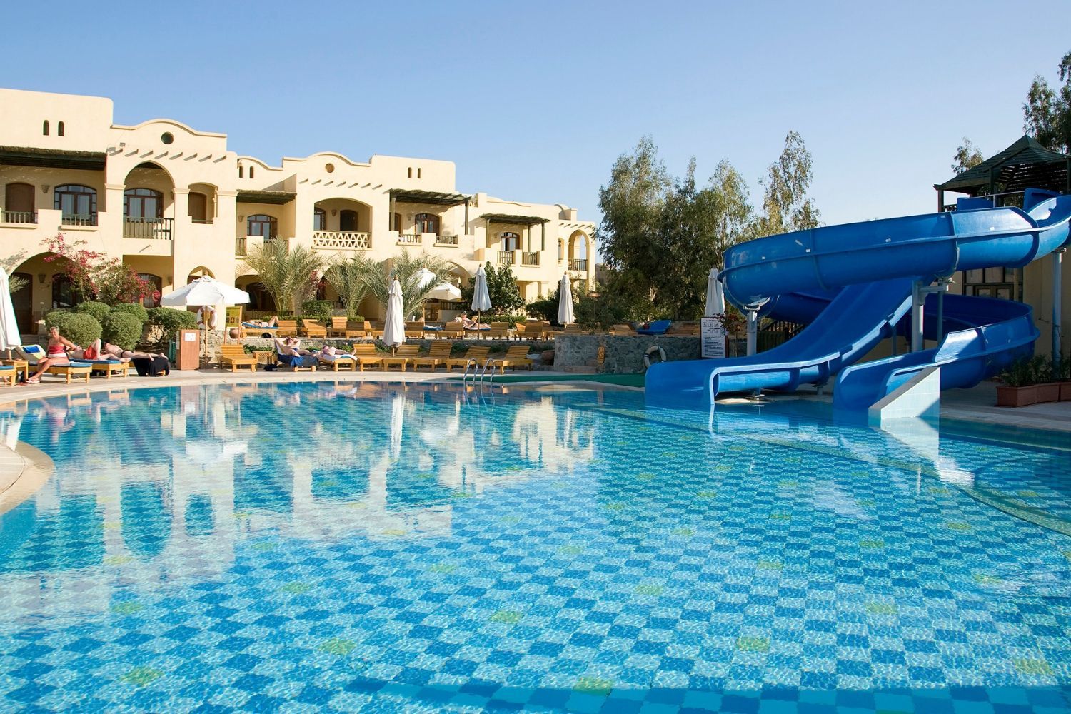 hotel exterior and outdoor swimming pool