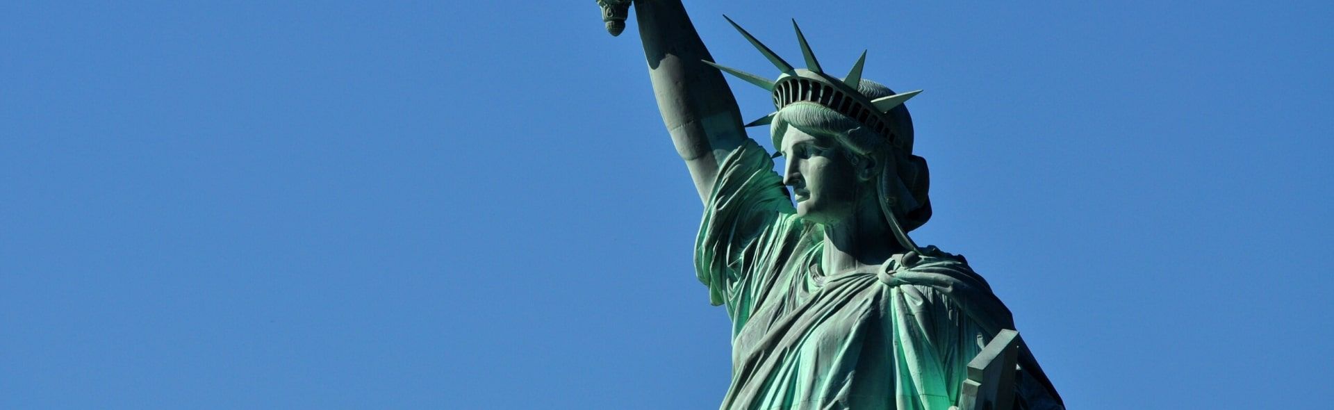 The Statue of Liberty on a sunny, cloud free day