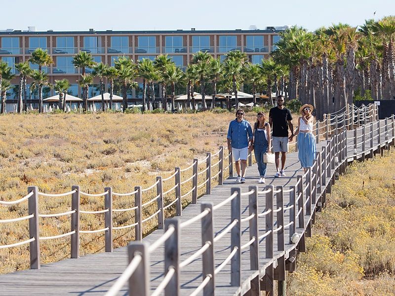 wide promenade leading down to the beach