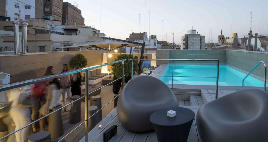 seating area near the outdoor rooftop swimming pool