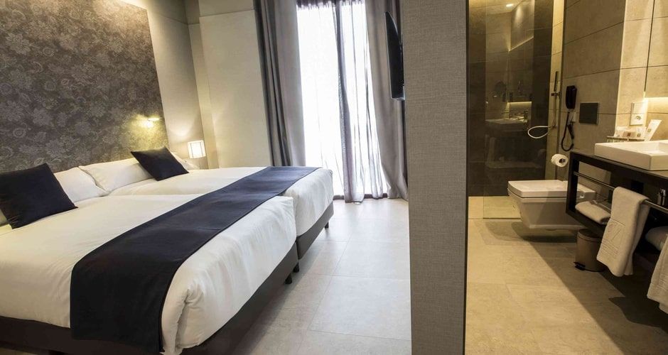 spacious bedroom and interconnecting bathroom